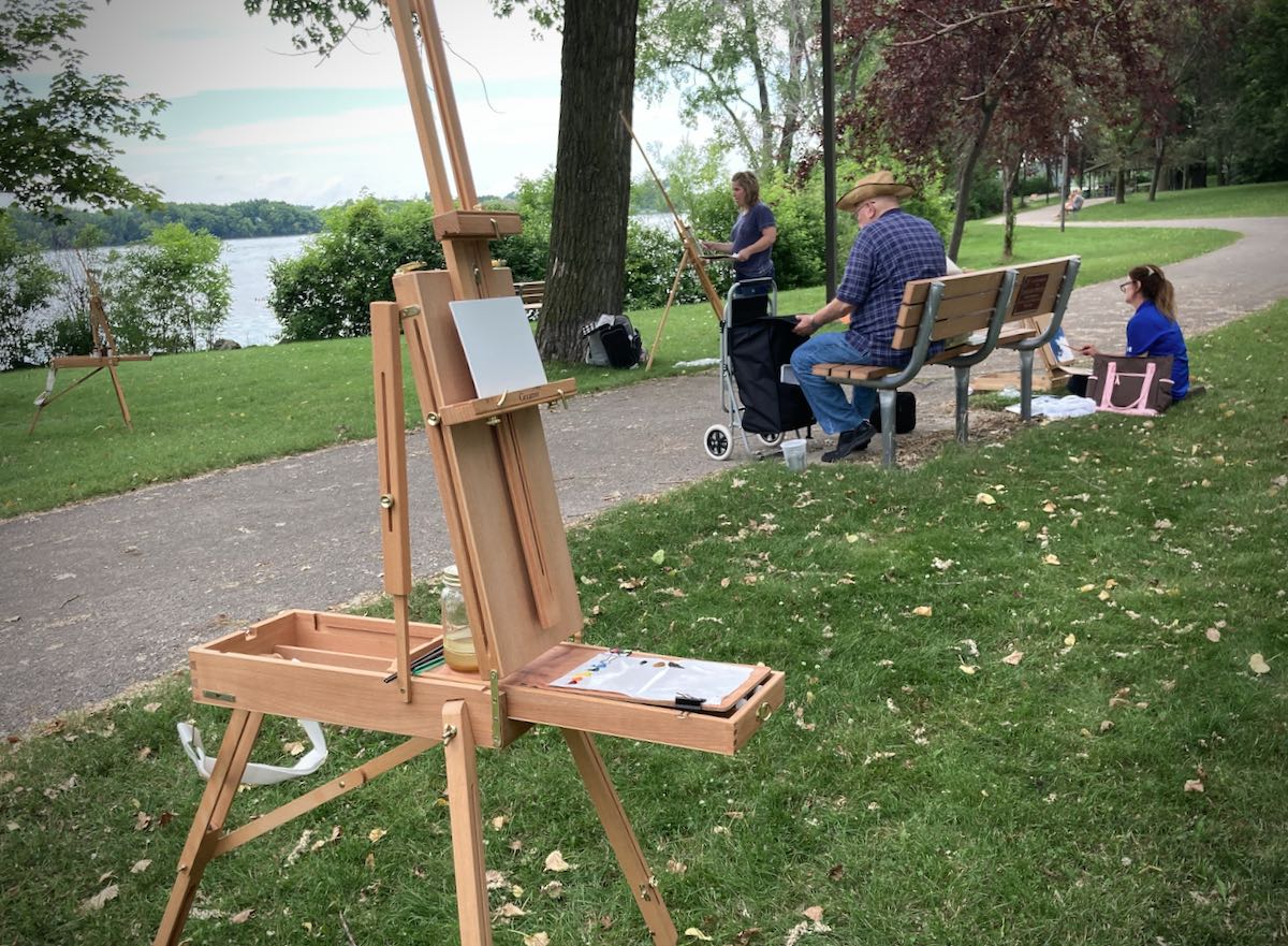 Park painters with easels